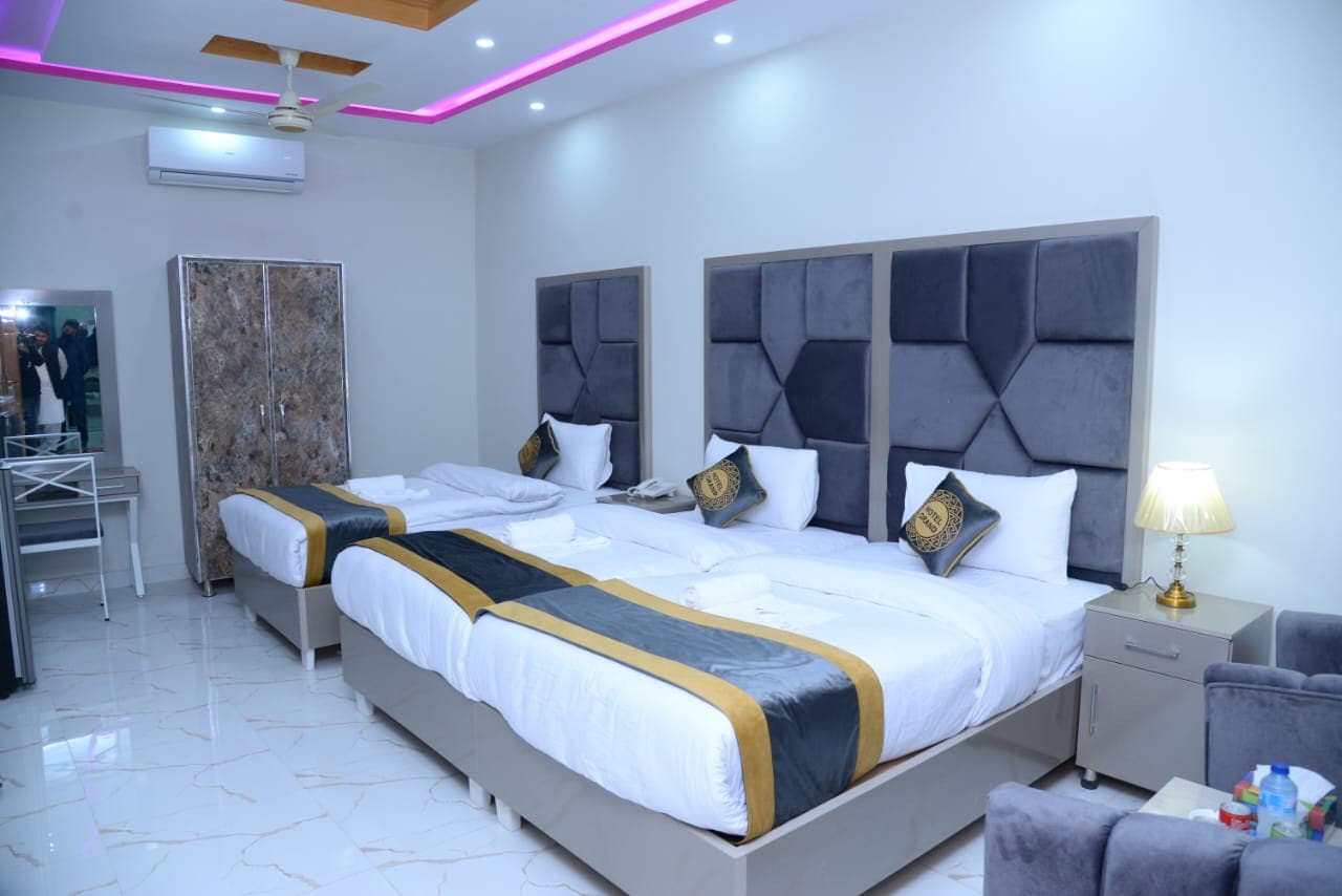 Go Luxury Grand Hotel Lahore Deluxe Triple Room